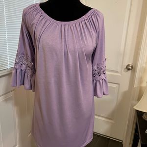 Cute purple tunic. Perfect for spring.
